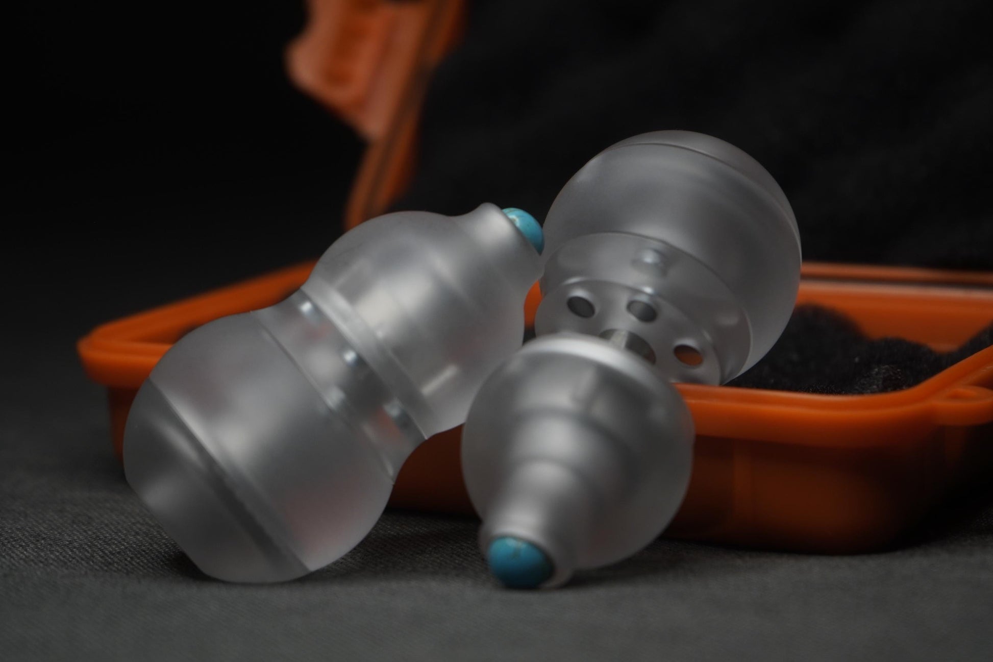 A sleek white gourd-shaped fidget toy featuring a 4-in-1 design: magnetic push card, fidget spinner, ratchet gear, and popping coin. Highlighting its durable PMMA material, ergonomic grip, and premium quality, perfect for stress relief and focus.