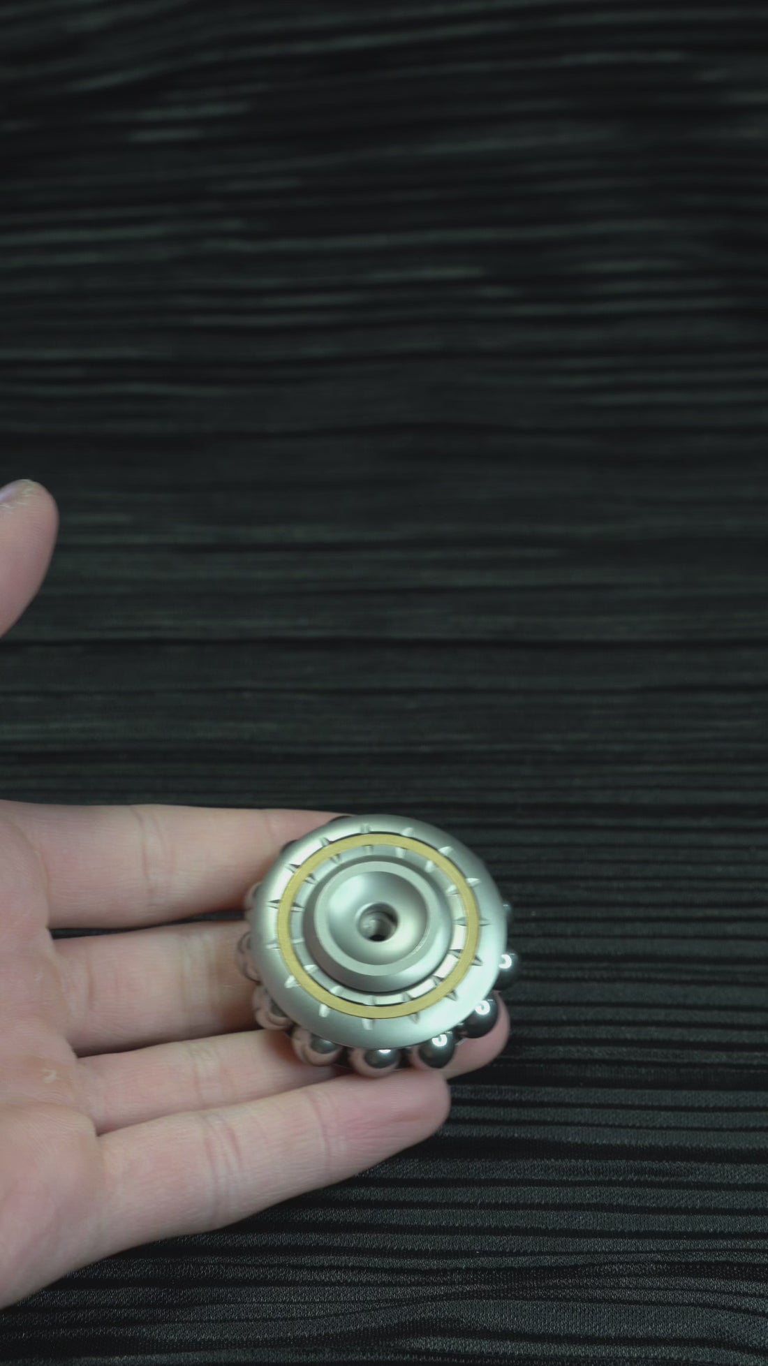 Cyber Beads Stick attachment joining the spinner, showing its magnetic slide and click modes.