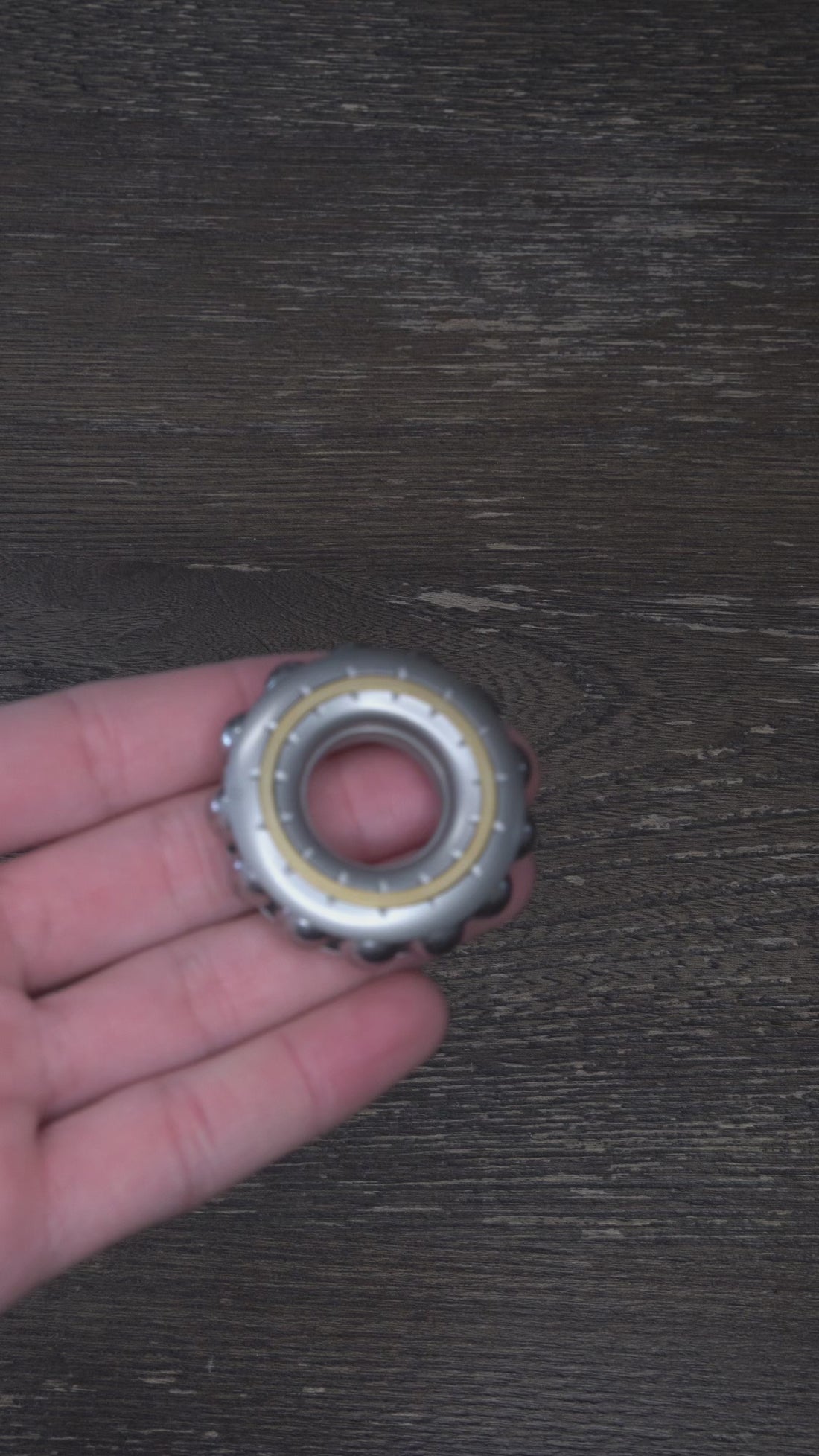 Cyber Beads Lock attachment clicking onto the spinner and demonstrating its locking fidget motion.